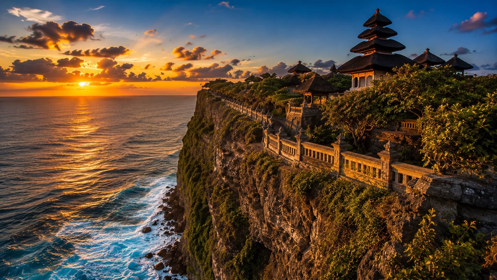 Uluwatu Temple on a clifftop in Bali at sunset