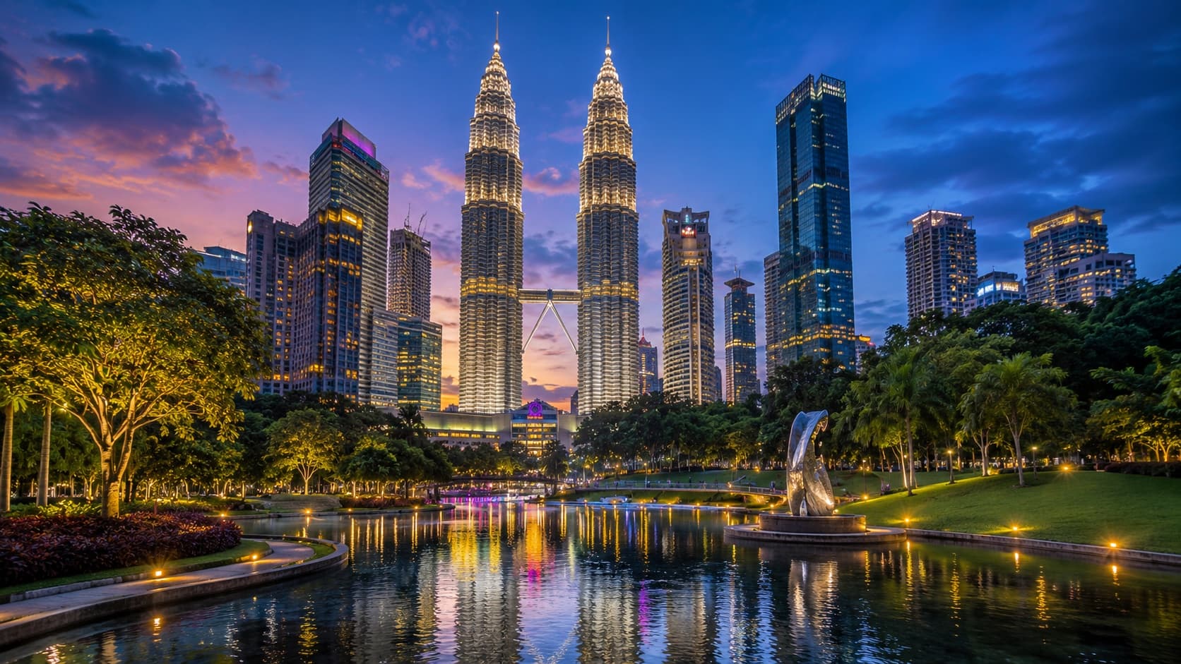 Kuala Lumpur Petronas Towers at dusk with KLCC park reflection