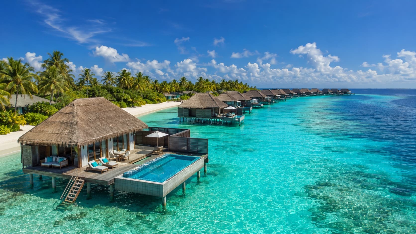 Maldives overwater villas with turquoise lagoon